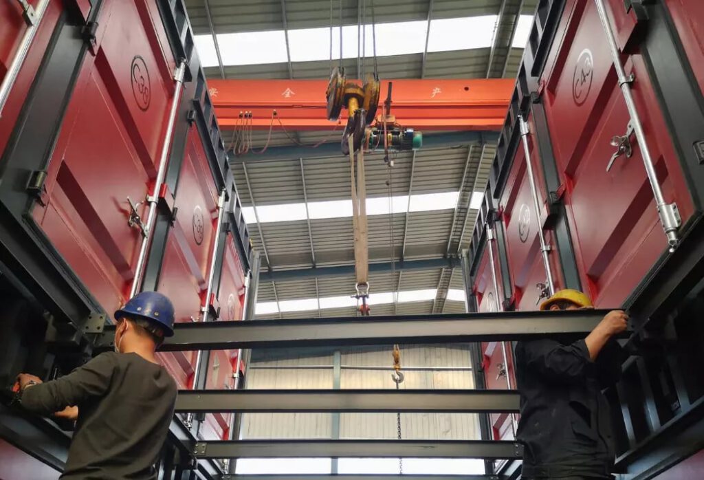 Workers at FOREMOST installing modular self-storage units, optimizing vertical space for efficien...